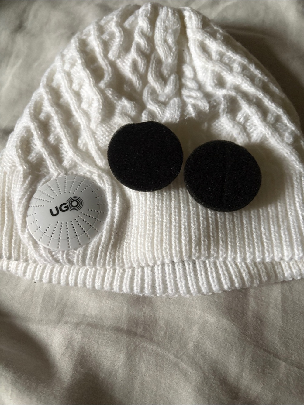 UGG White Cable Knit Kids Beanie with Black Earbud Covers